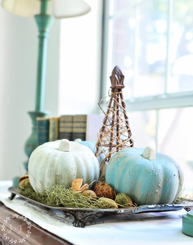 White Pumpkins With Teal Details And Earth Tones