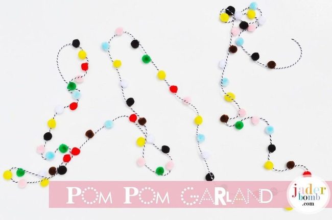 Colorful Pom Poms On Stripes