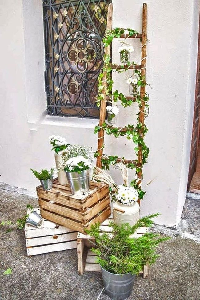 Stacked Wood Crates Overflowing White Flowers