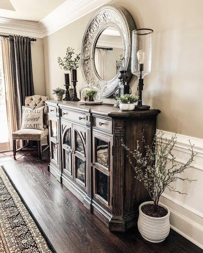 Large Mirror Above Dark Wood