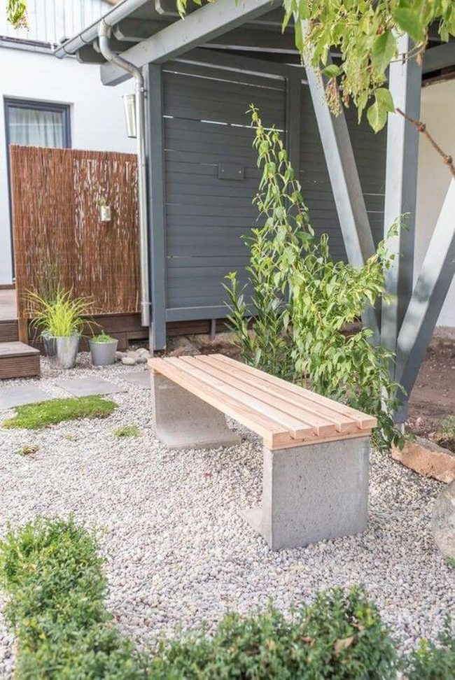Concrete Bench Among Green Layers