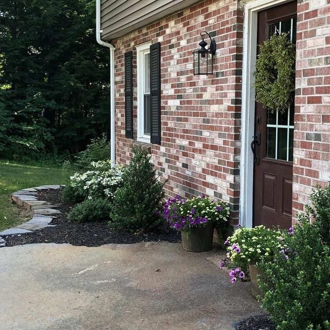 Brown Brick Entrance Green Wreath Welcome