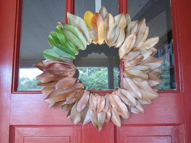 Red Door With Seasonal Leaf Wreaths