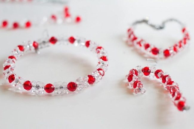 Red And Clear Beads On White