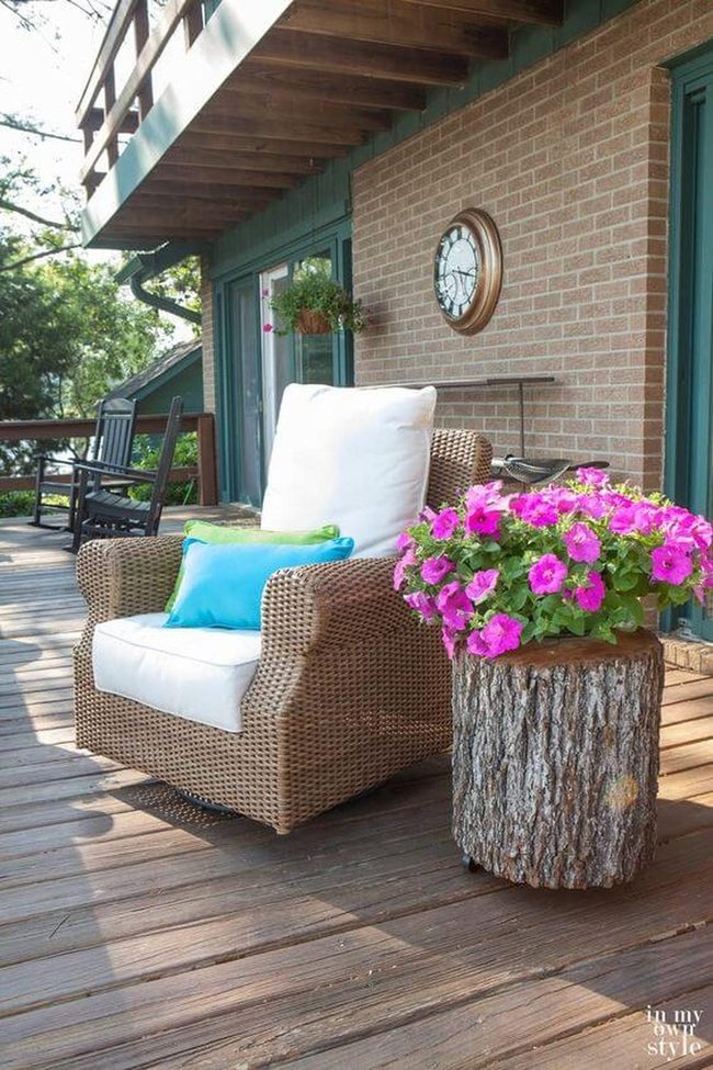 Wooden Chair Among Blooming Pots