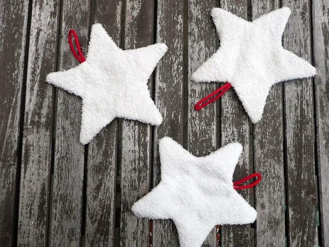 Fluffy White Stars On Weathered Wood