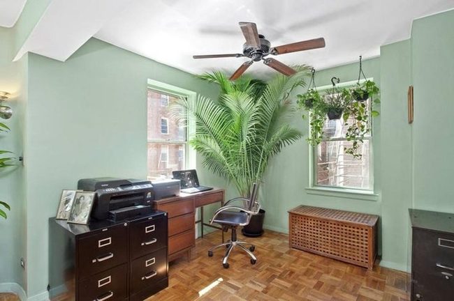 Green Walls Natural Light Workspace