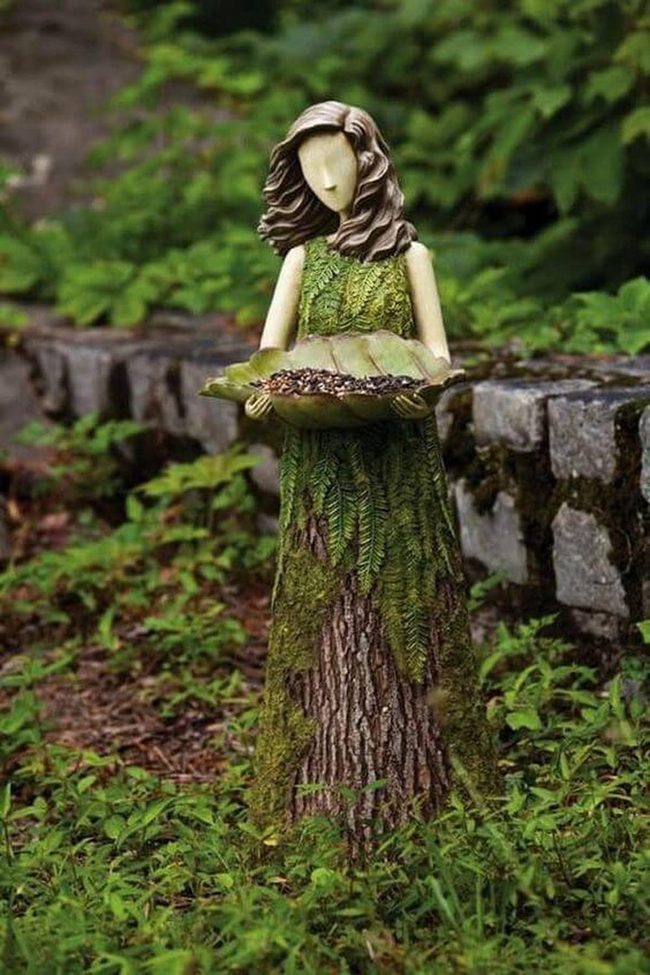 Wooden Figures Feed Birds