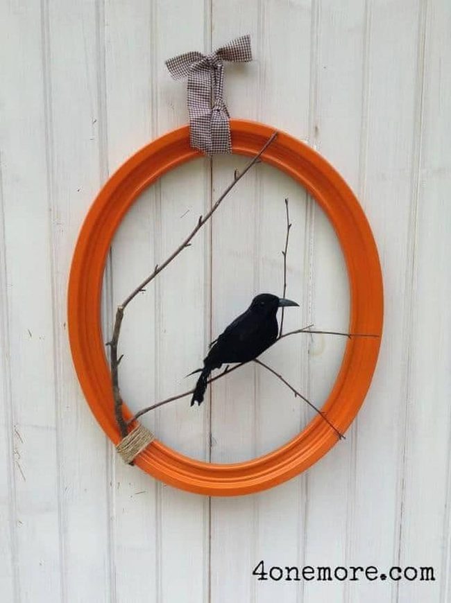 Orange Frame With Black Bird And Twigs