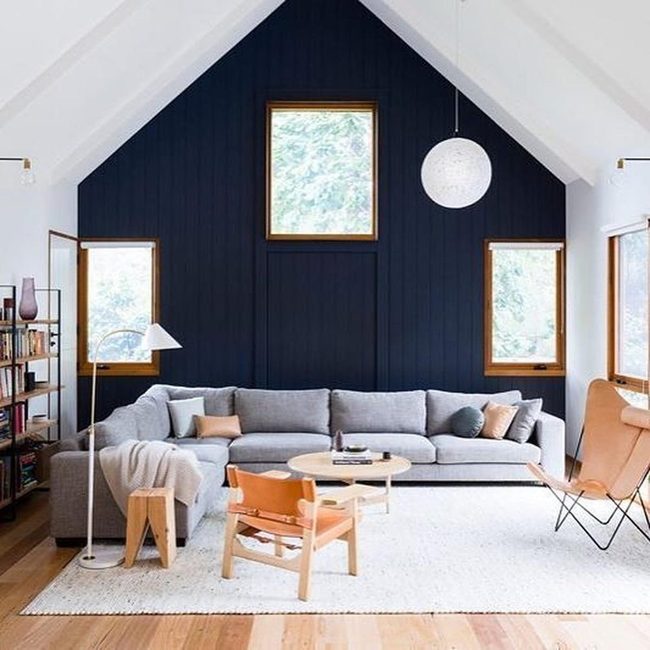 Navy Walls Gray Seating Light Wood