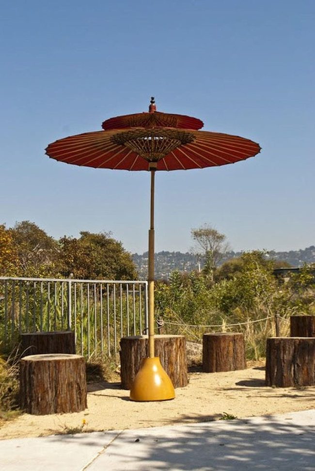 Red Umbrellas, Wooden Gathering Spots