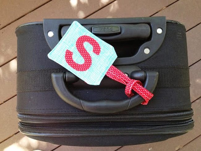 Black Luggage Red Rope Details