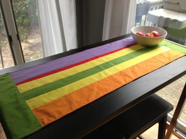 Rainbow Striped Table Runner Statement