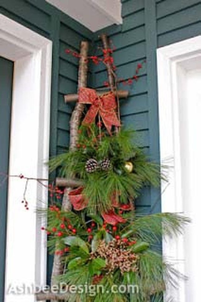 Wooden Ladder With Evergreen Branches
