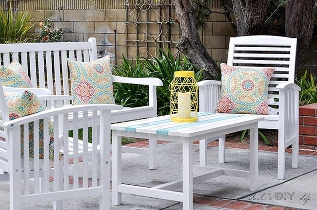 White Wooden Chairs With Striped Table