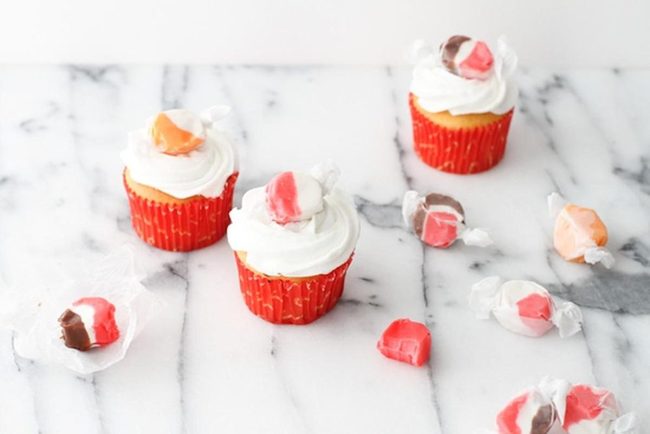 White Frosted Cupcakes On Marble