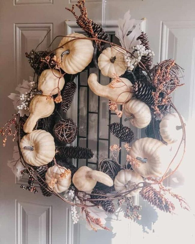 Beige Pumpkins on Grapevine