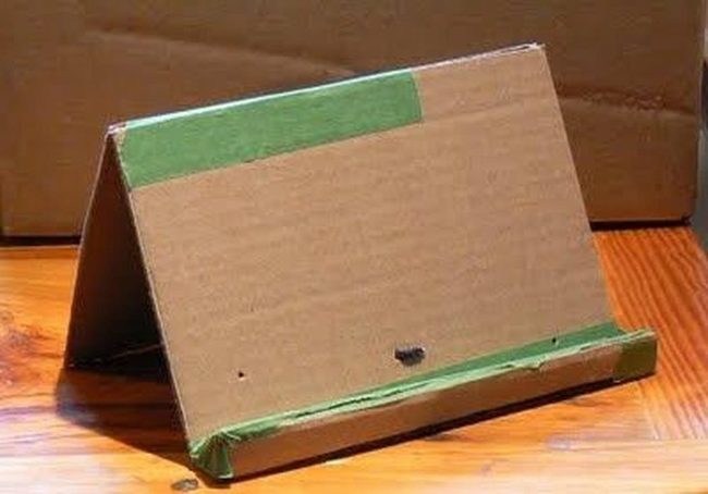 Cardboard Triangle With Green Tape Accents