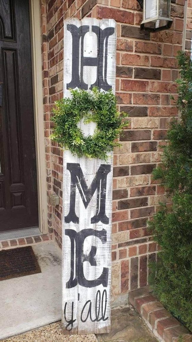 Weathered Home Sign With Fresh Wreath