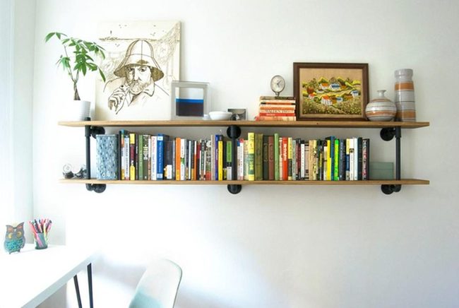 Sunlit White Walls With Colorful Books