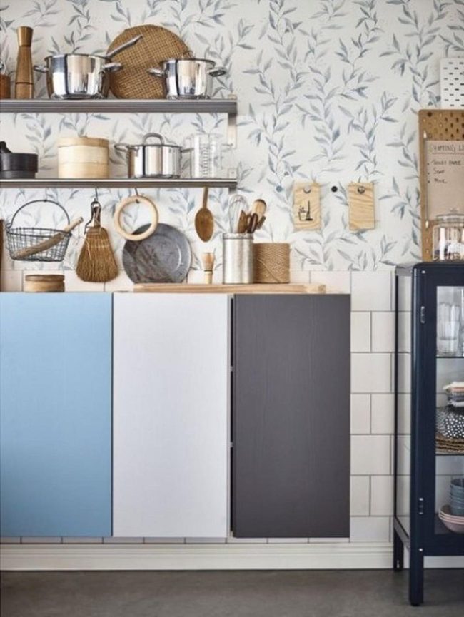 Leafy Walls Meet Light Blue Cabinetry
