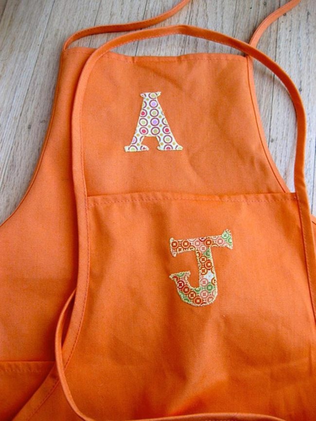 Orange Aprons With Fabric Letters
