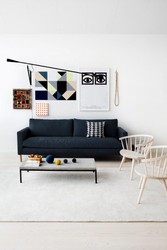 Dark Blue Sofas, White Walls, Modern Simplicity