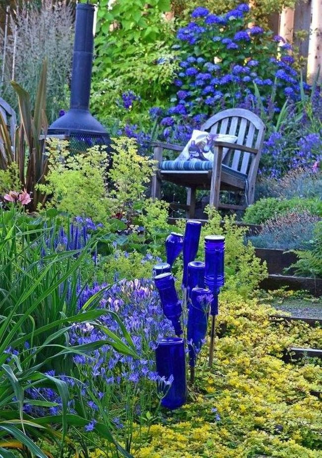 Blue Glass Bottles Garden Display