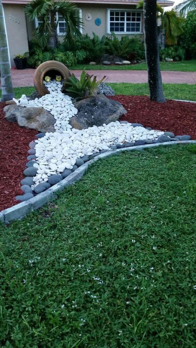 White Stone Flow Through Green