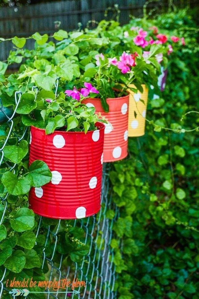 Tin Cans Dotted Garden Fence