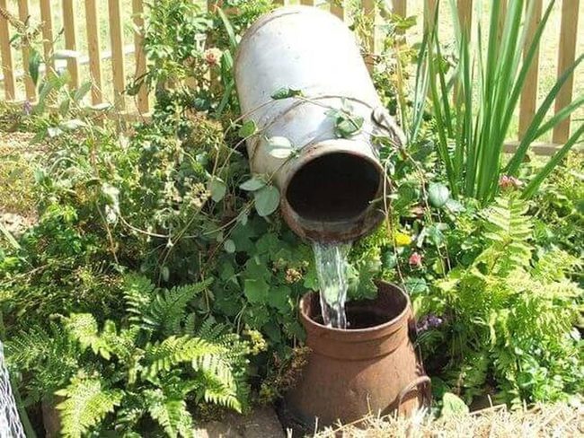 Stacked Milk Jug Water Feature