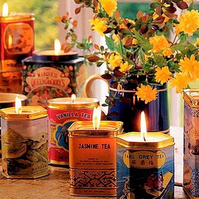 Yellow Flowers And Candlelit Gold Tins