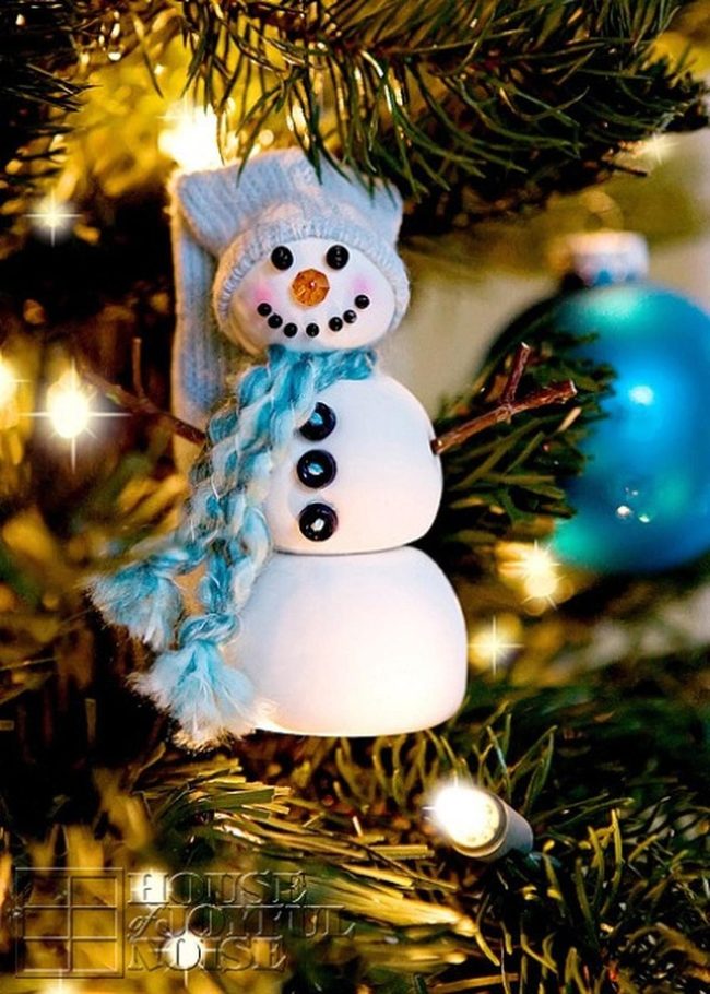Blue Scarves On Evergreen Branches