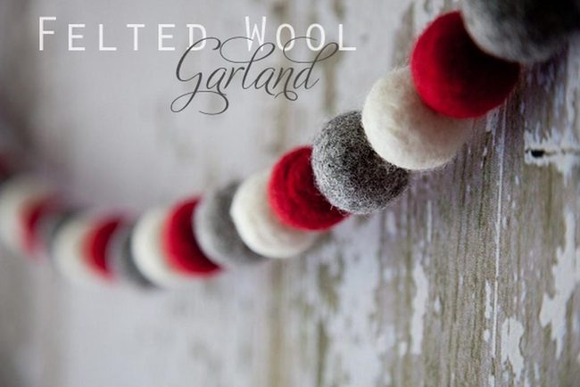 Red Wool Balls On Weathered Wood