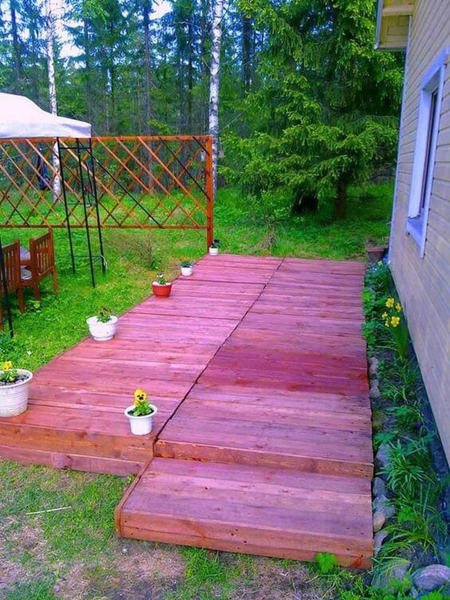 Reclaimed Pallet Deck With String Lights