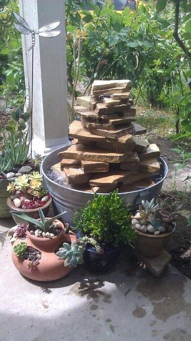Stacked Stone Fountain With Living Succulents