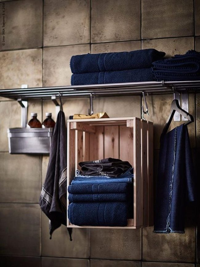 Deep Blue Towels Against Brown Textured Walls