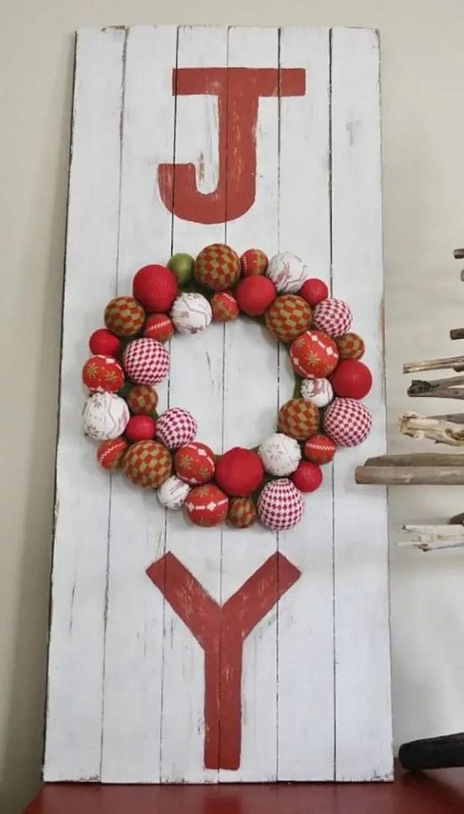 Red Letters On Weathered Wood