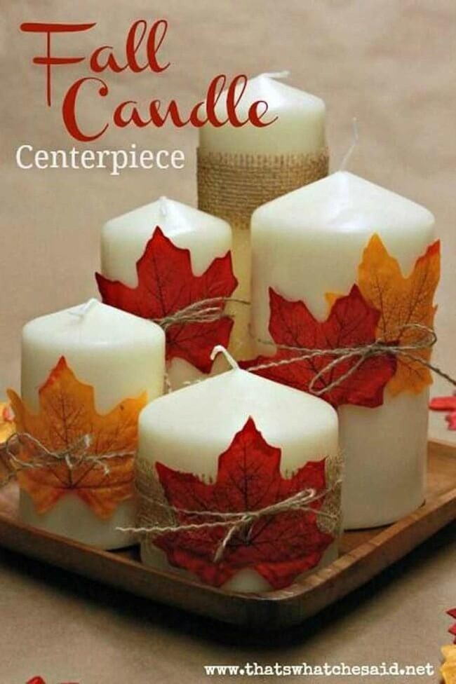 Autumn Candles With Scattered Leaves