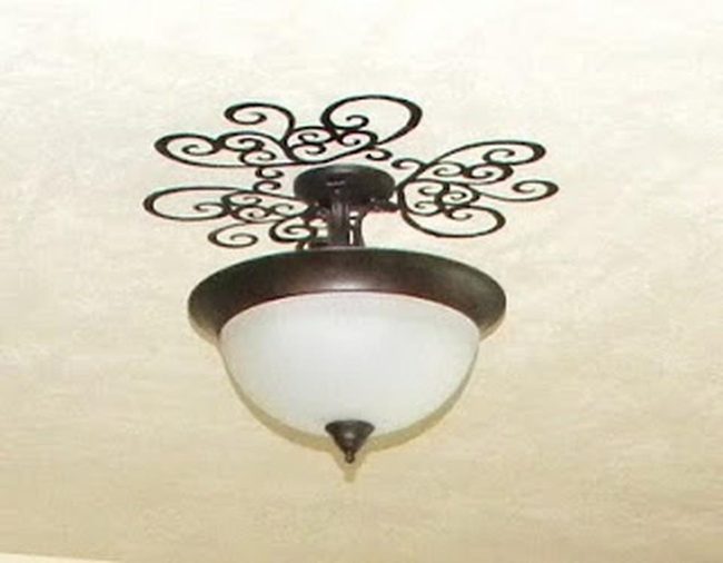 Dark Metal Swirls With Glass Shades