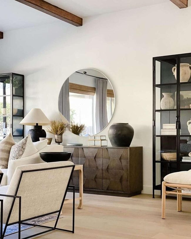Round Mirror Amplifies Light And Space