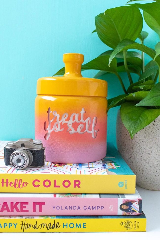 Yellow-To-Pink Books With Vintage Camera