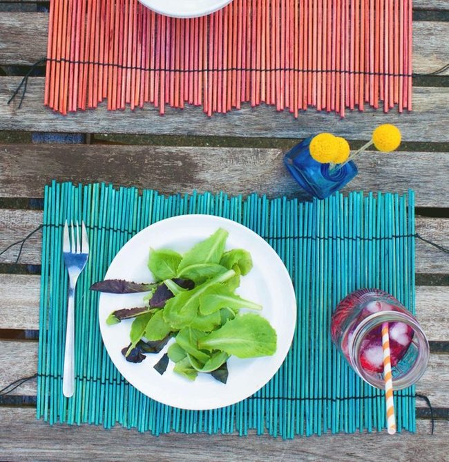Red And Blue Placemats On Natural Wood