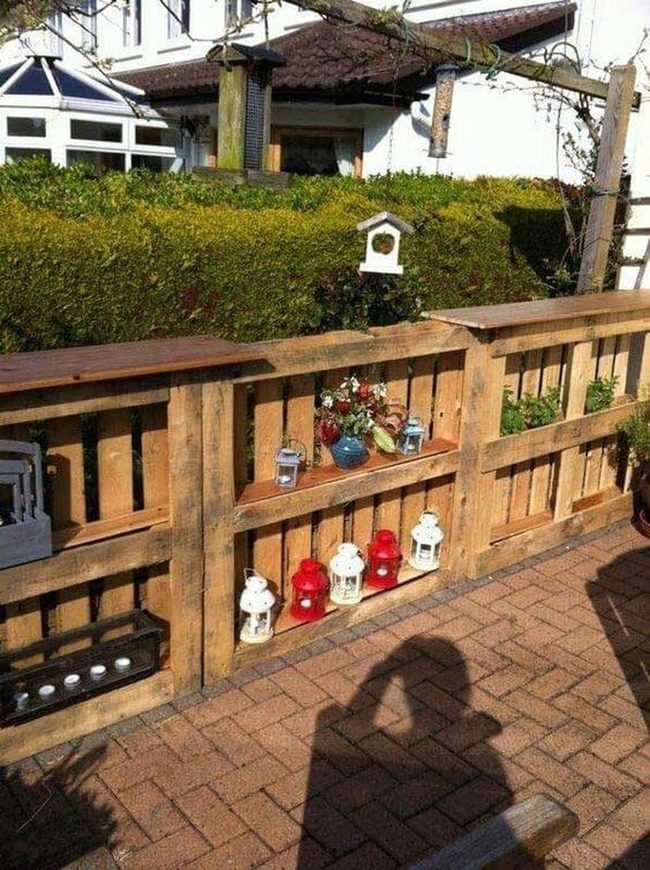 Wooden Fence With Flowering Planters
