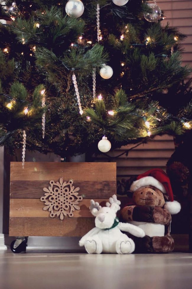 Green Branches Twinkling With White Ornaments