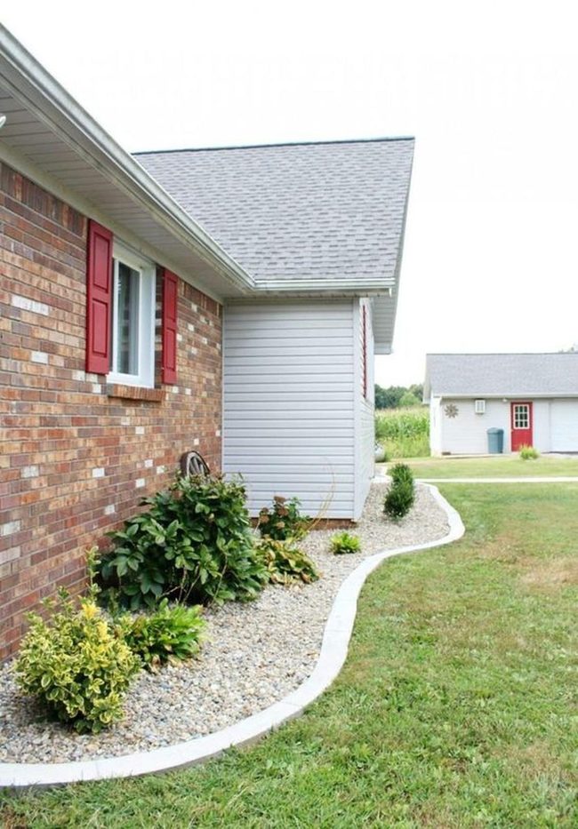 Red Shutters Pop Against Brick