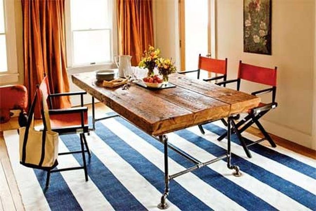 Orange Chairs Define Dining Space