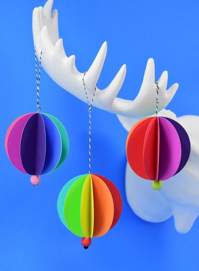 Colorful Paper Spheres White Backdrop