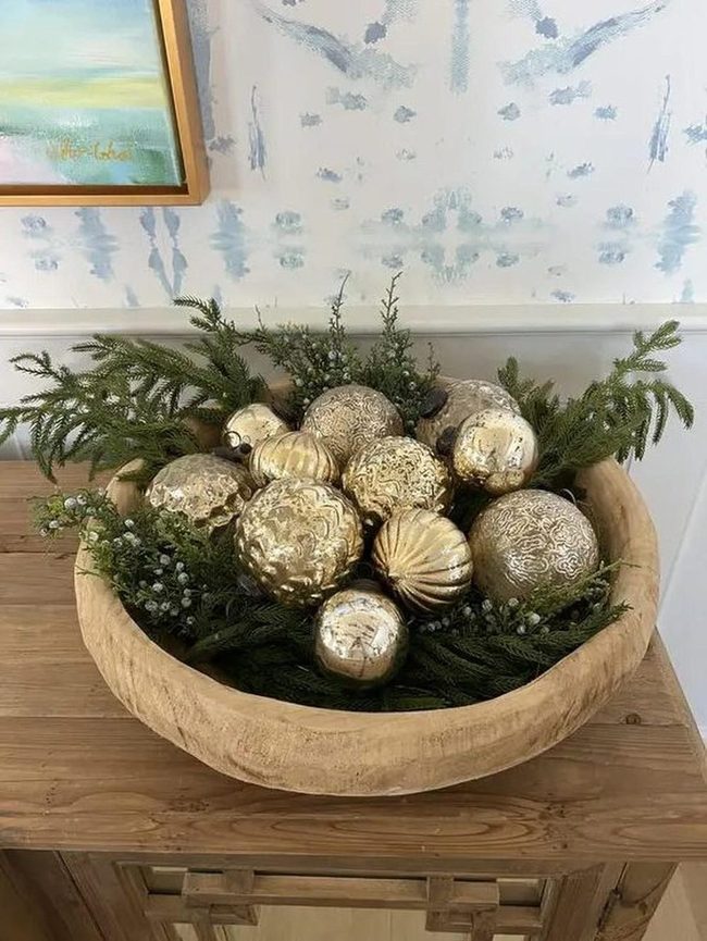 Golden Ornaments In Natural Wood Bowls