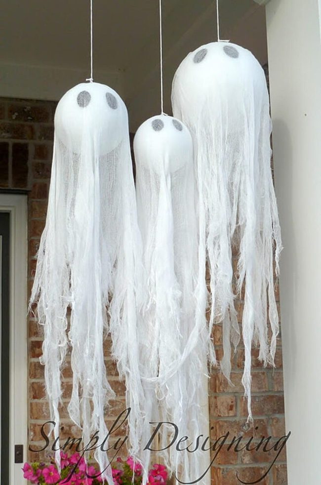 Floating Cheesecloth Ghosts With Cartoonish Eyes